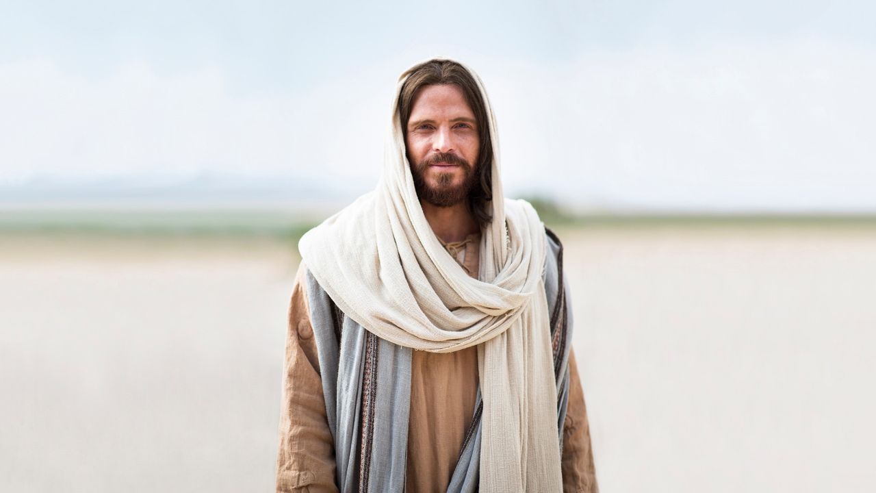 Jesus Christus lächelt und fordert alle auf, zu ihm zu kommen